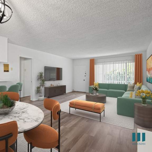 a modern living room with a dining table and chairs.