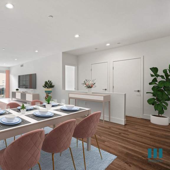 open-concept dining and living room with patio