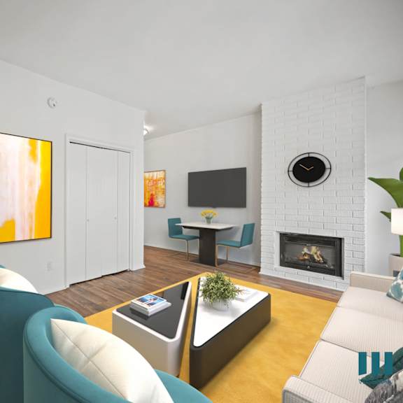 a modern living room with a fireplace and a painting on the wall.