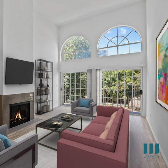 living room with lots of large-size windows, electric fireplace, and vinyl flooring