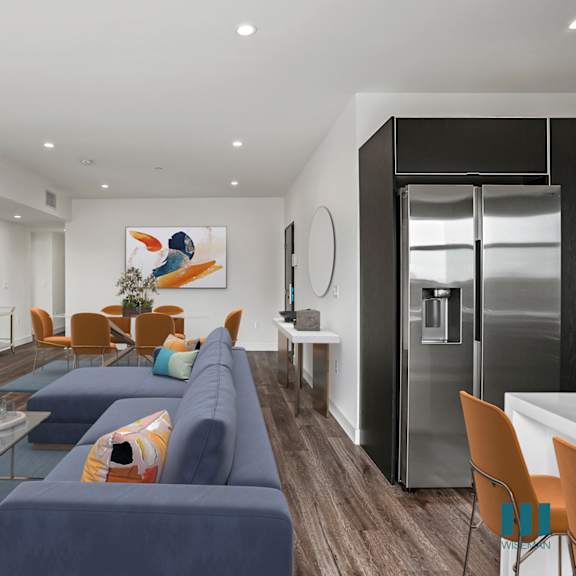 open-concept kitchen, dining, and living room with vialy flooring and recessed lighting