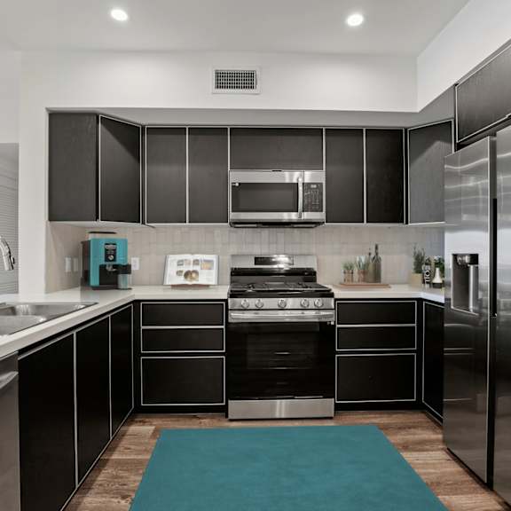 large-size kitchen with stainless-steel appliances