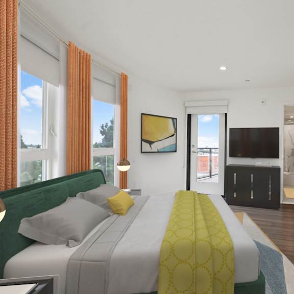 modern bedroom with a bathroom, mirrored closet, and patio