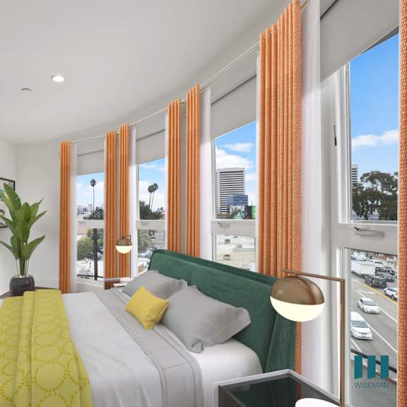 modern bedroom with lots of windows providing natural light and a mirrored closet with built-in organizers