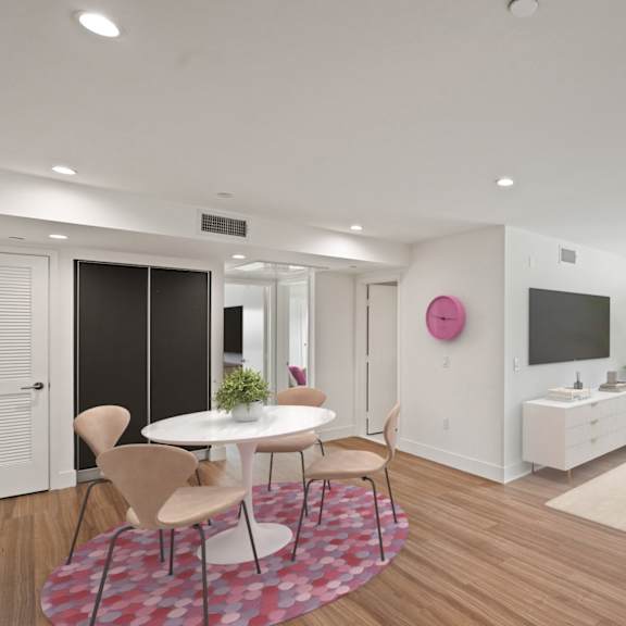 dining and living room with large-size windows and built-in storage cabinets