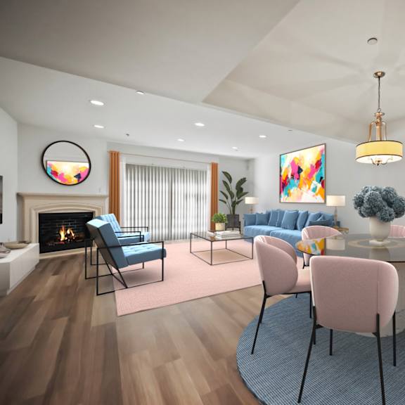 open-concept dinign and living room with fireplace and patio
