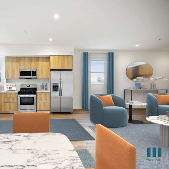 a living room and kitchen with a table and chairs