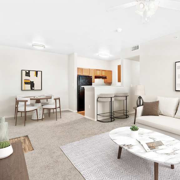 a living room with a white couch and a coffee table.