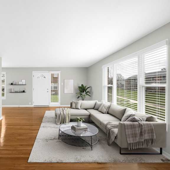 a living room with a couch and a coffee table