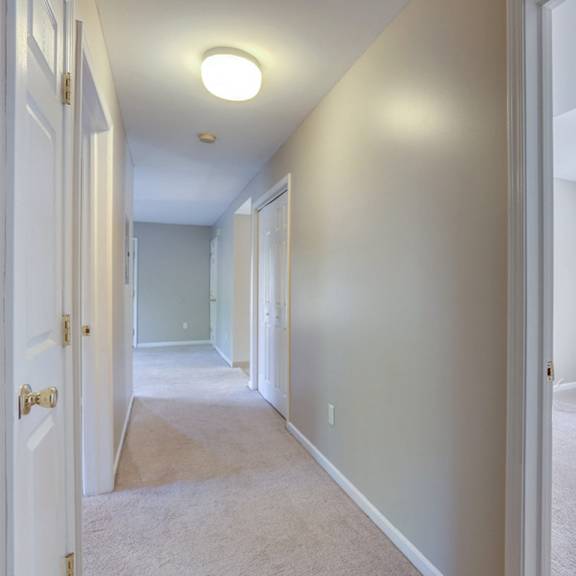stonington park apartments – living room – getzville area – appliances included - 24 hour emergency maintenance – fireplace - balcony – carpeting - pet friendly - garages – ask for a tour - basic fios
