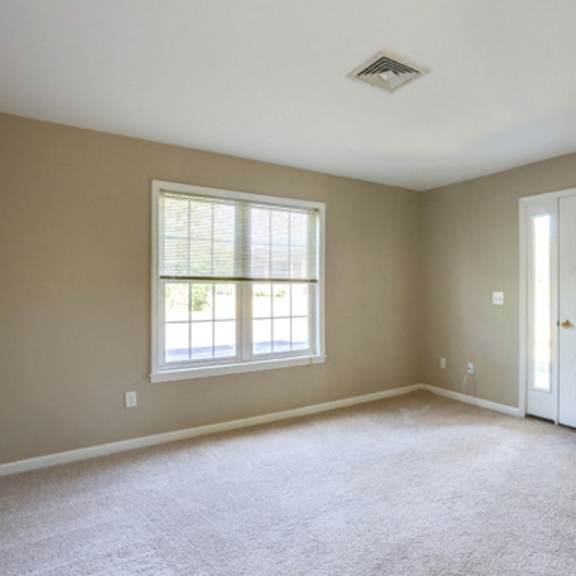 stonington park apartments – living room – getzville area – appliances included - 24 hour emergency maintenance – fireplace - balcony – carpeting - pet friendly - garages – ask for a tour - basic fios
