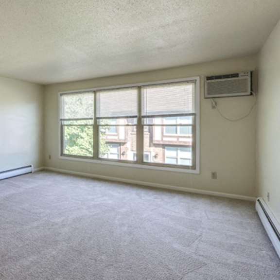 london towne apartments – living room – sweet home schools - air conditioner - appliances included - 24 hour emergency maintenance – ask for a tour - pet friendly