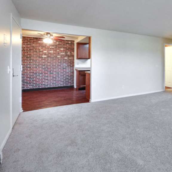 london towne apartments – living room – sweet home schools - air conditioner - appliances included - 24 hour emergency maintenance – ask for a tour - pet friendly