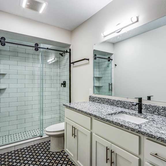 bathroom with shower cabin at san sofia luxury apartments, cleveland