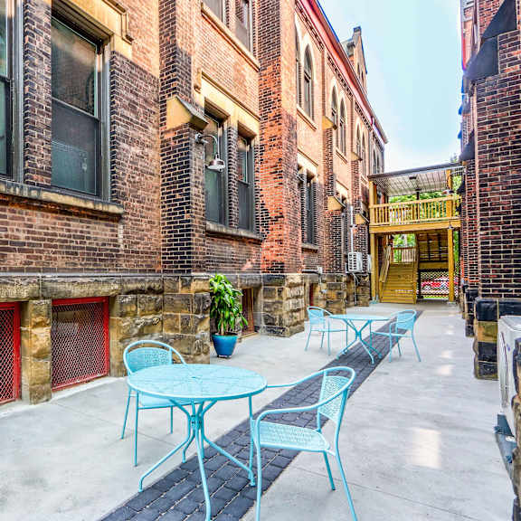 beautiful common courtyard with tables and chairs at san sofia luxury apartments, cleveland, ohio, 44113