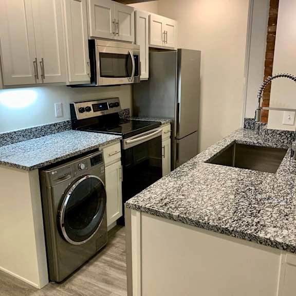 kitchen with stainless steel appliances and granite countertops, san sofia apartments, cleveland, oh, 44113