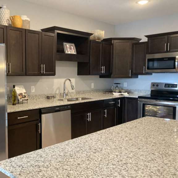 kitchen with dark cabinets