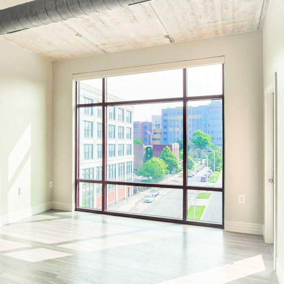 floor to ceiling windows at studio one apartments, detroit, mi