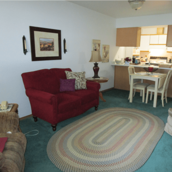 louise garden furnished living room and kitchen