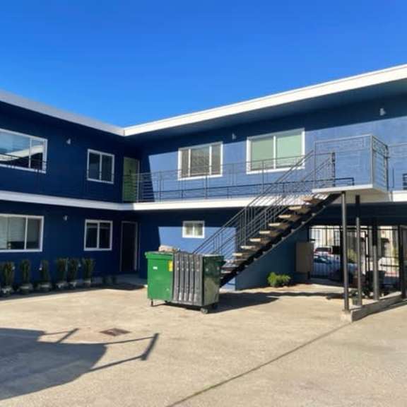 a blue building of 1640 6th ave.
