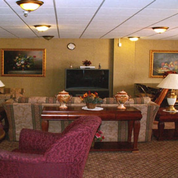 community room with seating and tv