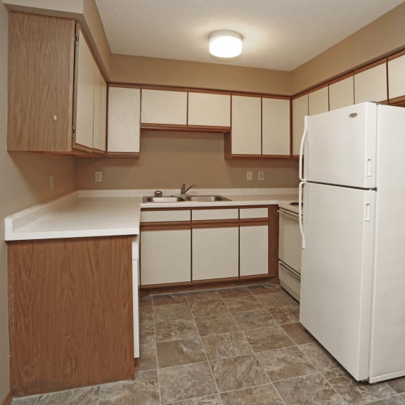 kitchen with white and brown cabinets