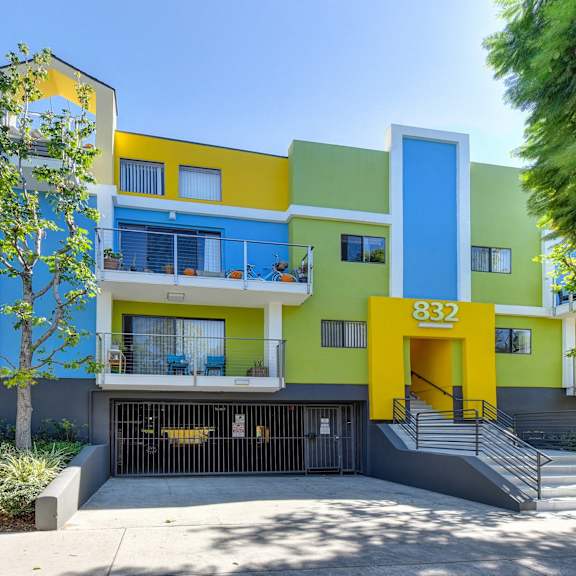 community entrance with private patios at croft plaza apartments, west hollywood california