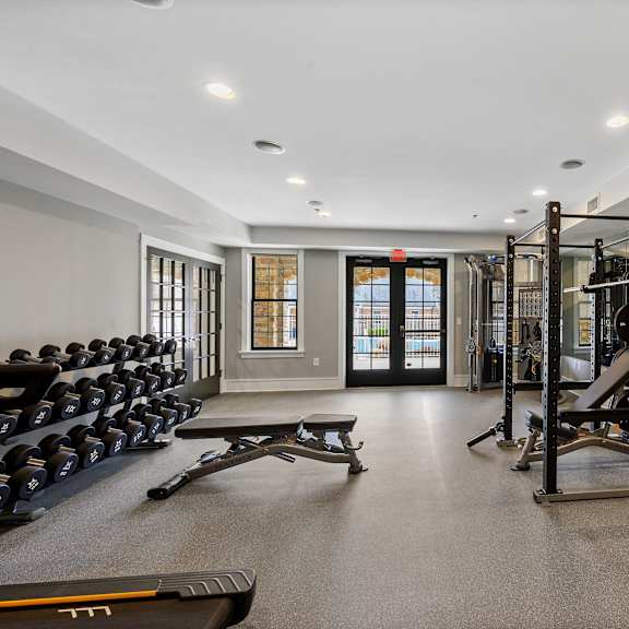 well-equipped fitness center at claremont apartments in exton, pa, offering a range of exercise options for residents