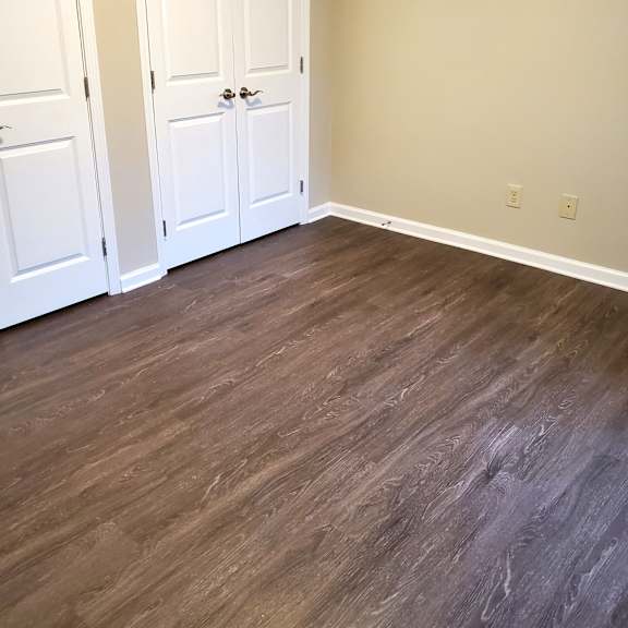bedroom wood floor and closets