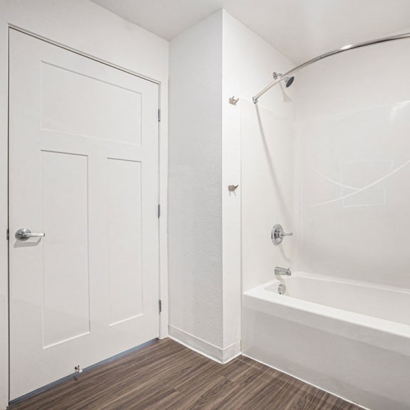 Thumbnail 13 of 14 Bathroom with bathtub and shower at Eagle Ridge Apartment Homes, Traverse City