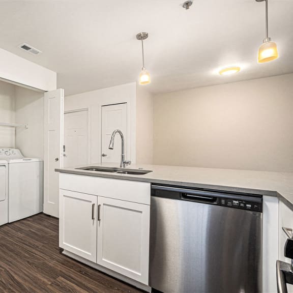 Thumbnail 11 of 15 Full size washer and dryer at Eagle Ridge Apartment Homes,  Michigan