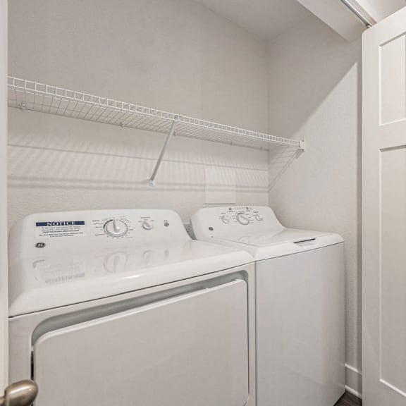 Thumbnail 9 of 17 Full size washer and dryer provided at Eagle Ridge Apartment Homes, Traverse City