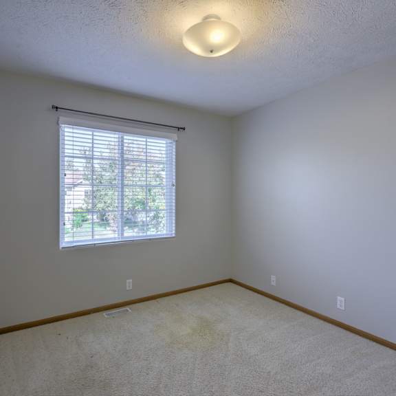 a room with a window and a door.