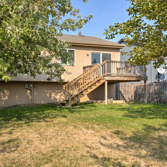 a house with a tree in front of it.