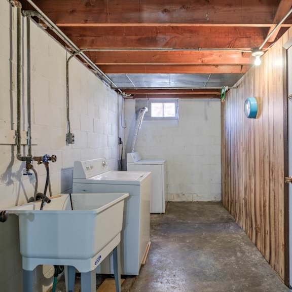a laundry room with a washer and dryer.