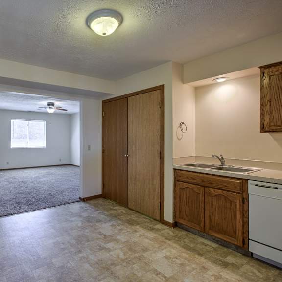 a room with a sink and a window.