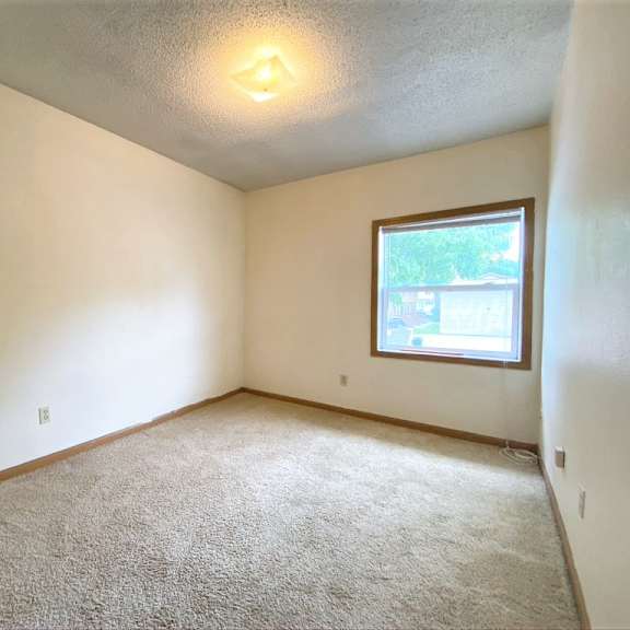townhome | 4 br | 2 bath | bedroom #1 | three sixty real estate