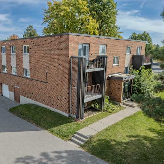 brown building showing the exterior of 112 breckenridge drive.