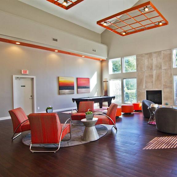 clubhouse sitting area at the falls apartments in raleigh nc