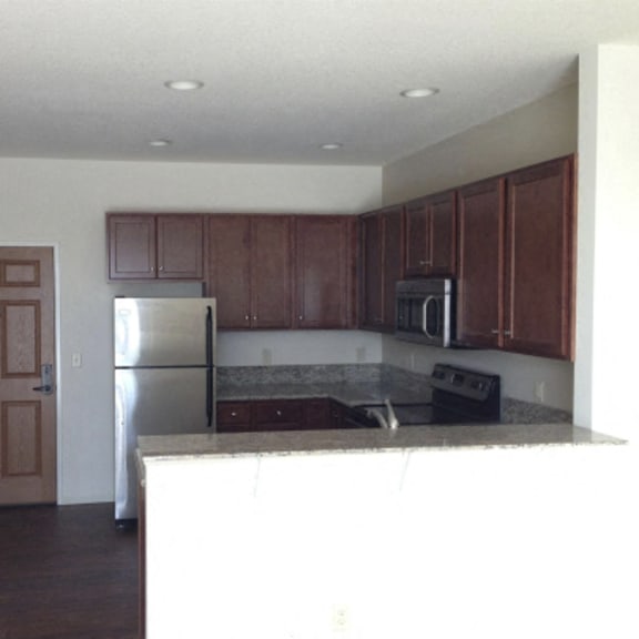 kitchen opens up to living room area