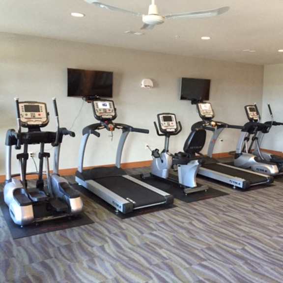 fitness center with updated equipment at paragon place at bishops bay, wisconsin, 53597