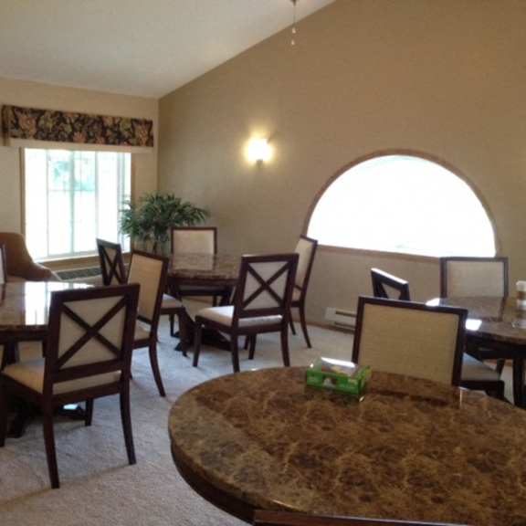 multi-purpose room with furnished interiors at foresthill highlands apartments & townhomes 55+, franklin, wi,53132