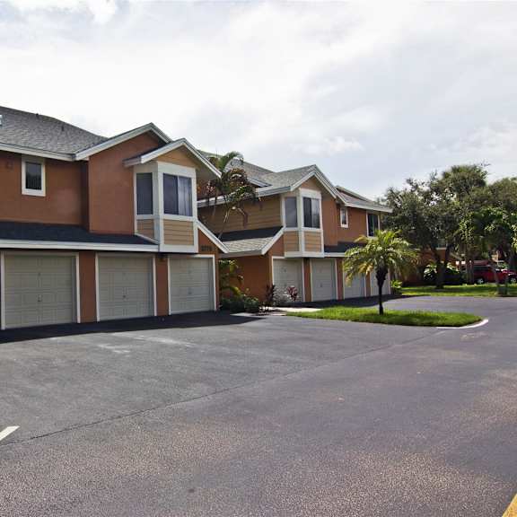 parking area at the villages of banyan grove apartments in boynton beach fl