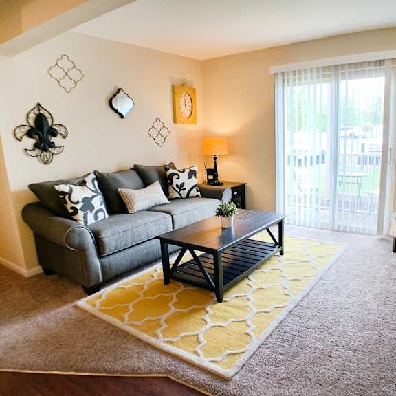 living room interior at crown station apartments, amelia, oh