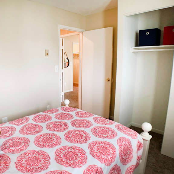 lavish bedroom with ample storage at crown station apartments, amelia, 45102