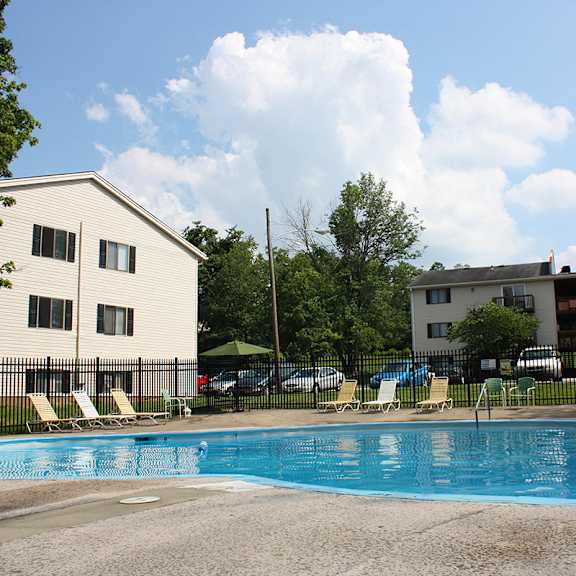 swimming pool with sundeck at oakwood apartments, florence, ky