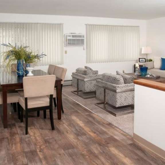 dark hard wood flooring in dining room of 8920 wentworth apartments in minneapolis, mn