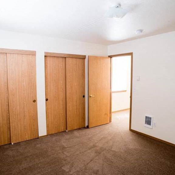 bedroom with closet at lorence court apartments, portland