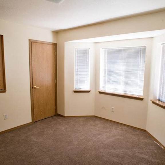 expansive windows for natural light at lorence court apartments, portland, or