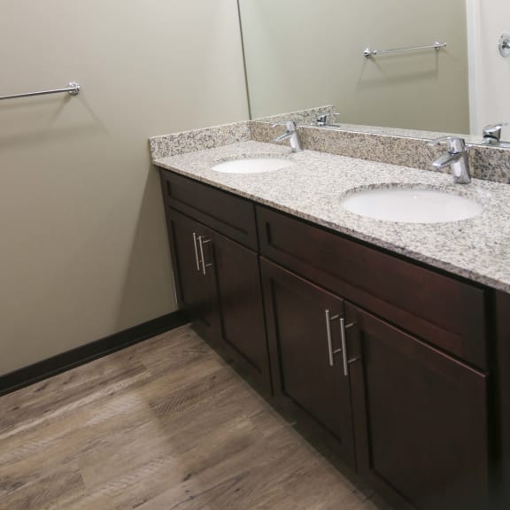 Thumbnail 17 of 19 Master bathroom with shower and double sinks with granite countertops in 3 bedroom apartment for rent at North Pointe Villas best apartments Lincoln NE 68521